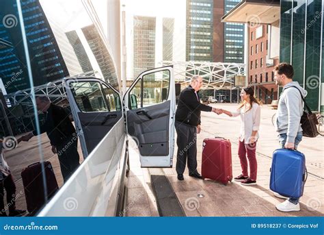 Airport Shuttle Driver And Passengers In A Big City Stock Image Image