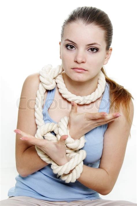 Young Woman Tied Up With Rope Over Stock Image