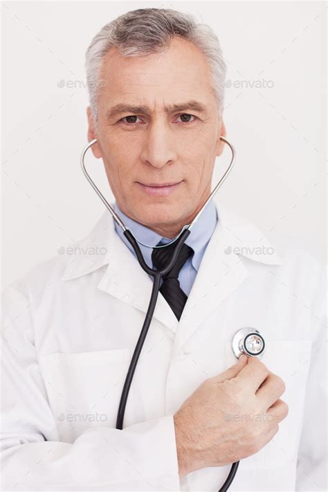 Doctor Examining Himself Stock Photo By Gstockstudio Photodune