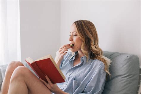 Woman Reading A Book Indoor By Stocksy Contributor Mak Stocksy