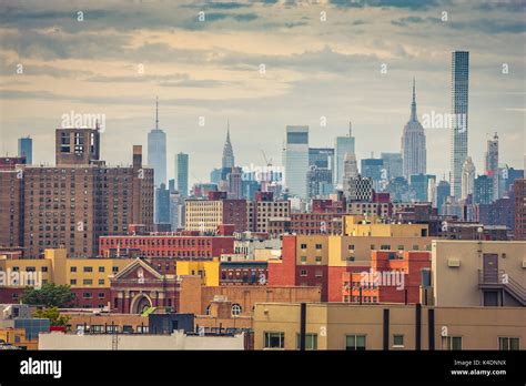 New York City Skyline Bronx Rooftops And Manhattan On The Background