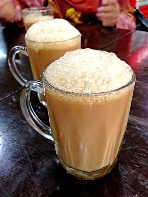 Teh tarik (literally pulled tea or 拉茶 in chinese) is a hot indian milk tea beverage which can be commonly found in restaurants, outdoor stalls and kopi tiams in southeastern in malaysia, there are occasions where teh tarik brewers gather for competitions and performances to show their skills. Teh tarik, either hot or cold, will always be my favorite ...