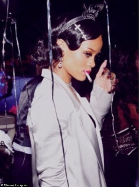 Well She Is Rihanna Singer Puffs On Suspicious Looking Cigarette As