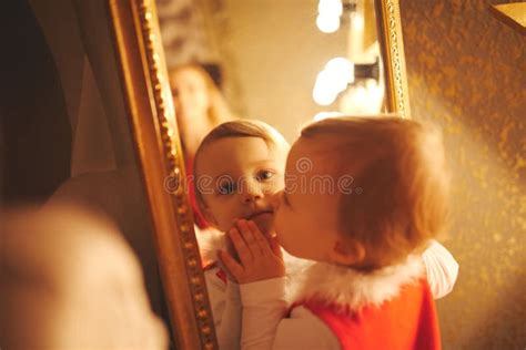 Little Girl Kisses Herself In The Mirror Stock Image Image Of Cute