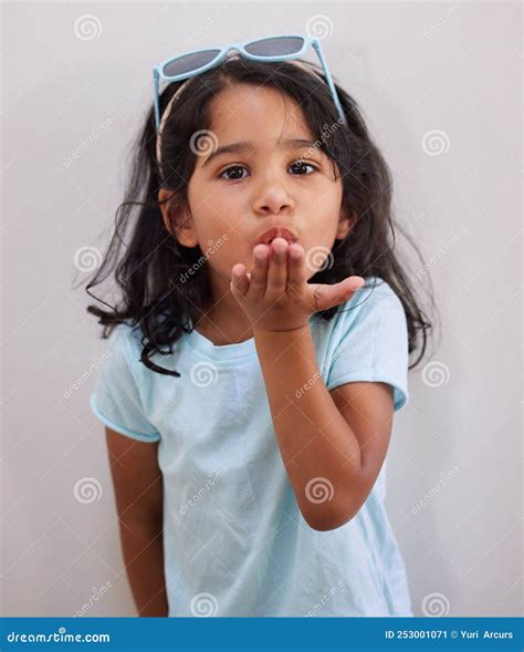 Im Blowing Some Kisses Your Way An Adorable Little Girl Blowing A Kiss