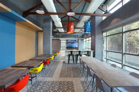 The Office Design Has Industrial And Raw Exposed Feel