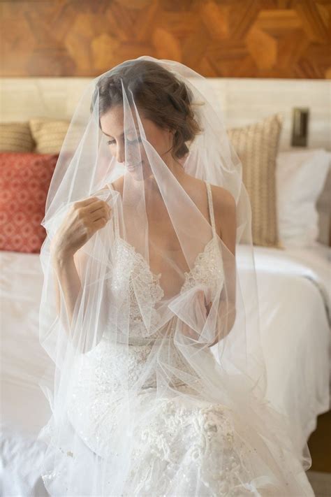 Wedding Portrait Bride Getting Ready On Bed Berta Wedding Dress Bridal Veil Over Face Tulle