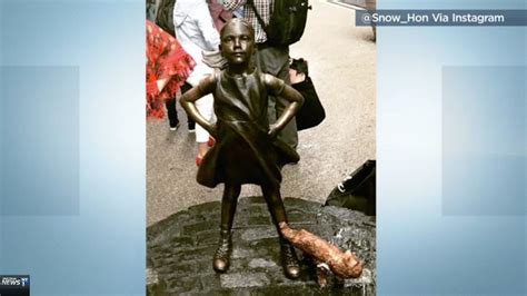 Fearless Girl Statue Briefly Protested By Pissing Pug Statue