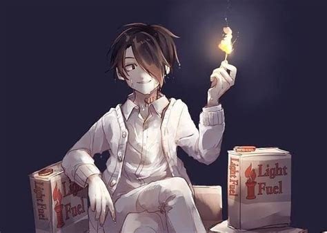 A Man Sitting On Top Of Boxes Holding A Lit Candle