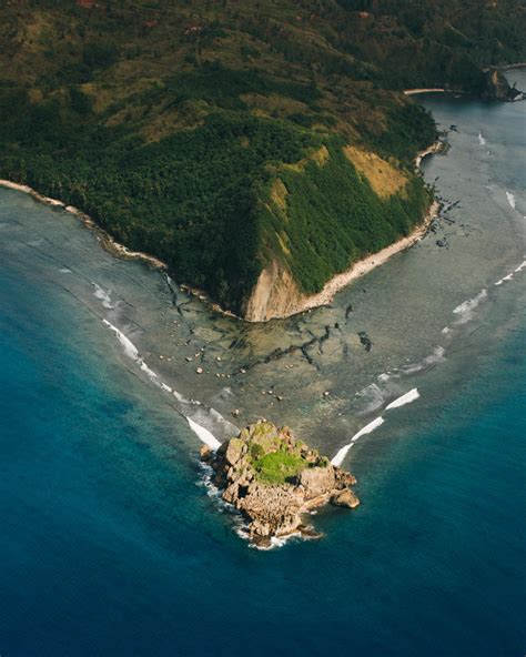 Find this soaring structure built on the site of a 1669 catholic mission. Piti, Guam | The Piti Underwater Observatory & Piti Bomb Holes