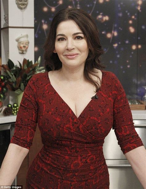 nigella lawson shows off her curvaceous figure in body hugging dress