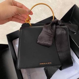 Charles & keith printed double zip backpack sale mini idr 290k sale med idr 300k color : Charles and Keith Fur Limited Edition Velvet Bow Detail ...