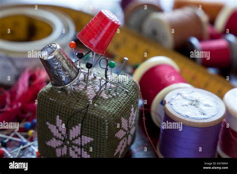 Pincushion With Pins And Cotton Reels Stock Photo Alamy