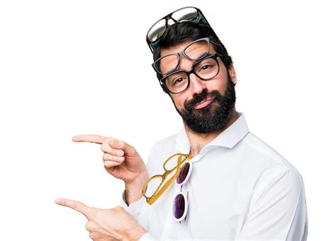 Premium Photo Handsome Man With Glasses Pointing To The Lateral