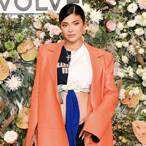 Kylie Jenner Bares Her Baby Bump In Striking Fashion