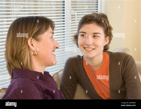 Mother Daughter Friends Having A Chat Stock Photo Alamy