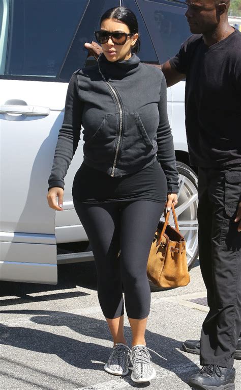 Kim Kardashian Shows Off Growing Baby Bump In Tight Workout Gear E News