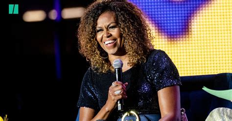 Former First Lady Michelle Obama Rocks Natural Hair At Essence Fest