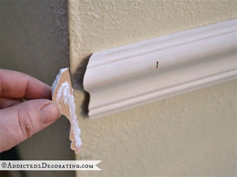 Take a piece of the chair rail and put it into a miter box. Tips For Installing Beautiful (Almost Flawless) Trim ...