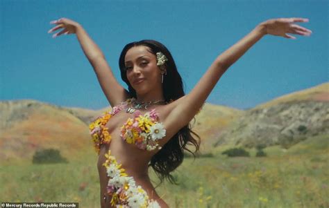 Doja Cat Runs Topless Through A Meadow In New Post Malone Music Video For Their Single I Like