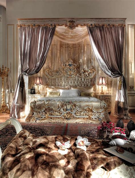 A Fancy Bedroom With An Elaborate Canopy Bed