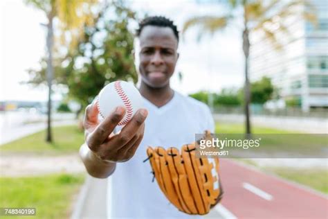 Man Hand Holding Ball Photos And Premium High Res Pictures Getty Images