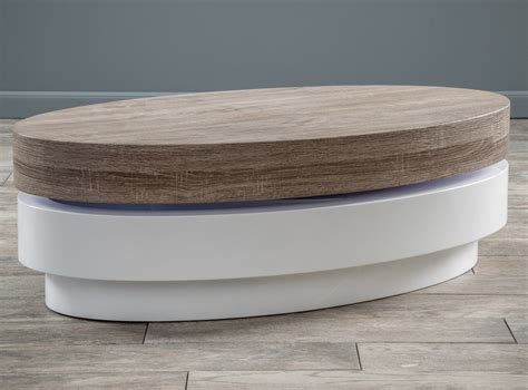 Choosing a coffee table is not something most people prioritize when it comes to decorating their living room. oval swivel coffee table | Coffee table white wood, Coffee ...