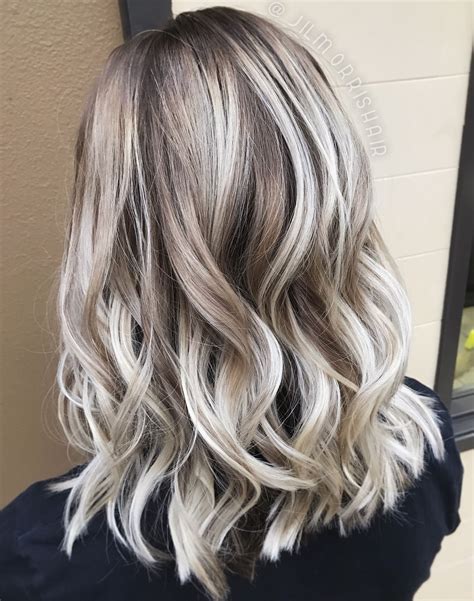 White Ash Blonde Balayage Shadow Root Curls In A Textured Lob Holiday Hair Ash Blonde