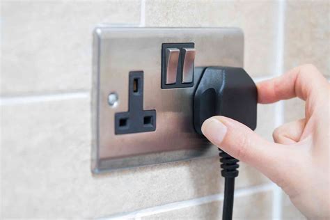 Adding a Plug Socket to a Room Cost in 2021 | Checkatrade
