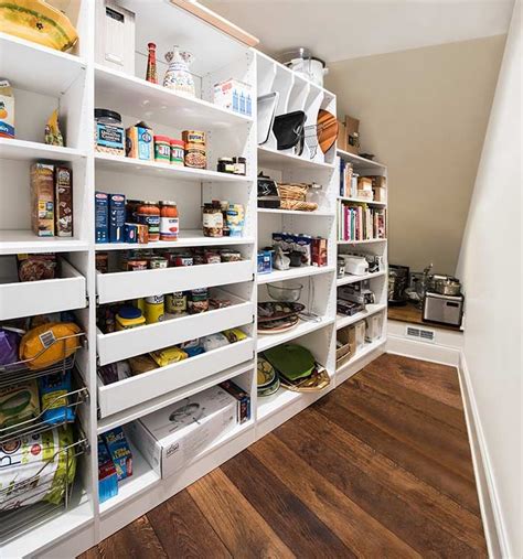 If you have a staircase, you shouldn't waste the space under it, use it for some smart build in open shelves for books under the stairs or make a stairs with boxes or drawers inside to place your books and other objects you like. Narrow Pantry with Pull-Out Pantry Shelves | Pantry ...
