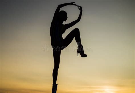 Female Silhouette On Sunset Sky Background Of Dancing Woman Silhouette Stock Photo Image Of