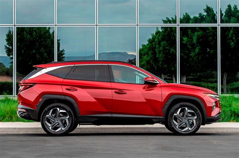 The 2022 hyundai tucson's interior has a spacious, airy cabin, with a wraparound design feature that starts at the doors and runs along the dash. 2022 Hyundai Tucson: Review, Trims, Specs, Price, New ...