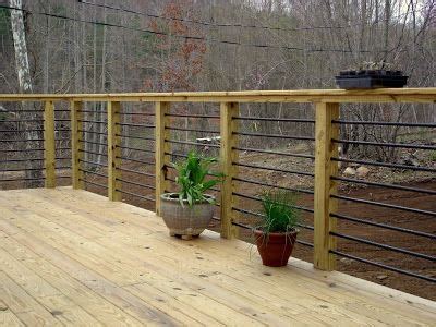See how rebar is used for the walls and handrails of a large deck. Rebar railing, Railings and Wood colors on Pinterest