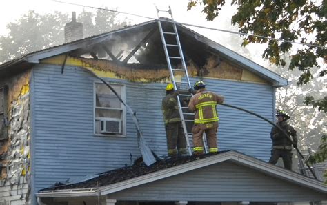 Possible Arson Fire Destroys Garage 2 Homes