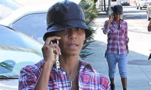 Jada Pinkett Smith Attempts To Hide Make Up Free Face With Low Slung