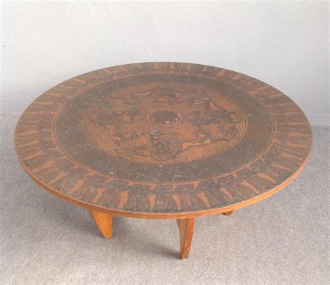 What size table top do you need depends on table size and how many people will be sitting. Round Copper Top Coffee Table, 1960s for sale at Pamono