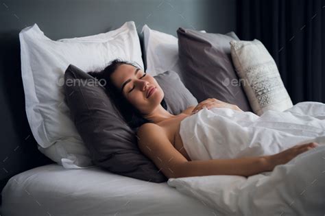 Hotel Travel And Happiness Concept Beautiful Woman Sleeping In Bed Stock Photo By Romankosolapov