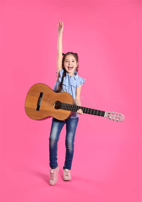 Cute Little Girl Playing Guitar Stock Photo Image Of Beginner