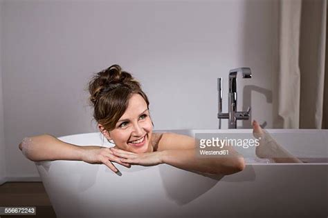 Mature Woman Relaxing Bubble Bath Photos And Premium High Res Pictures