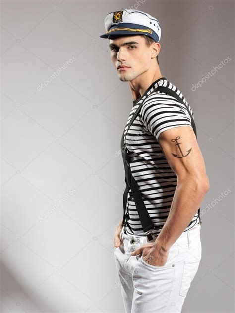 Very Attractive Young Male Model Dressed Like A Sailor Studio Shoot