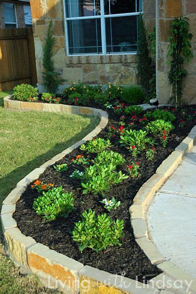 Rustic flower beds with rocks in front of house ideas 11. Front of houses, Flower beds and Front yards on Pinterest