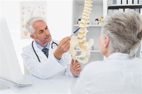 Spine Doctor Point At The Lumbar Spine Hamid Mir Md Spine Surgeon