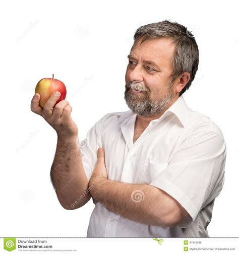 Middle Aged Man Holding A Red Apple Stock Photo Image Of Natural