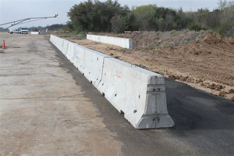 Transition for Anchored Temporary Concrete Barrier System in Asphalt ...
