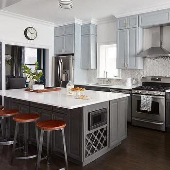 Upper cabinets are normally 18 inches above the countertop and 30 42 inches high. Blue Upper Cabinets and Gray Lower Cabinets | Grey kitchen ...