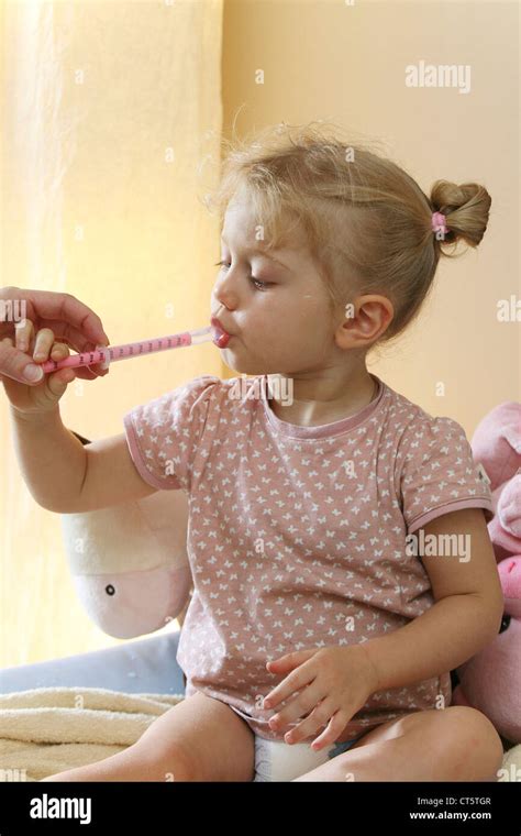 Child Taking Medication Stock Photo Alamy