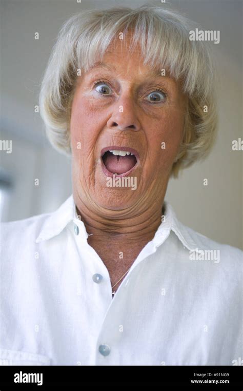 Senior Woman Acting Surprised Stock Photo Alamy