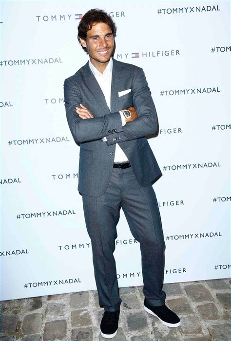 Rafael Nadal Dons Grey Suiting As He Poses For Pictures At Tommy