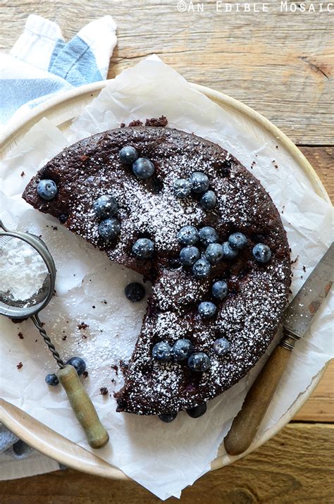 Chocolate cake made with olive oil. Dark Chocolate Olive Oil Cake with Blueberries and Ginger ...