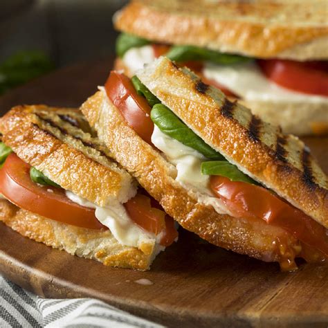 Add mayo, spinach, tomatoes and cheese to your sandwich and place on a skillet, or in a panini maker. Best Vegetarian Panini Recipes - Mushroom And Goat Cheese ...